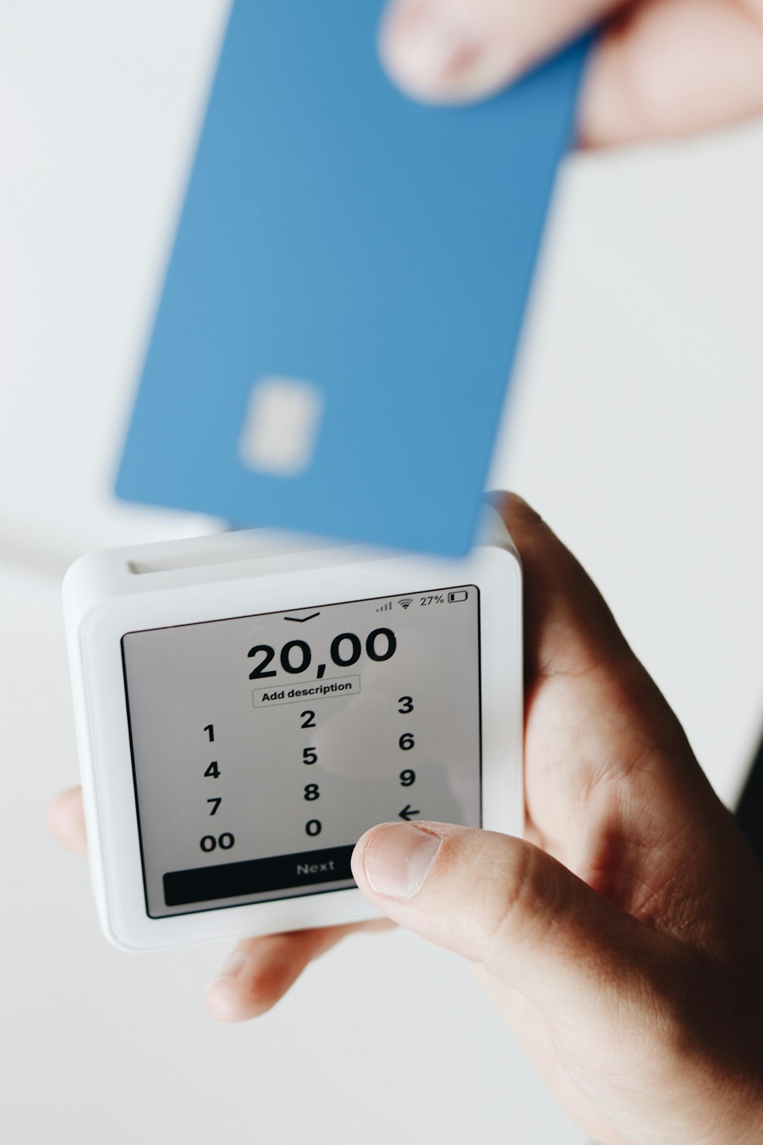 SumUp card reader showcasing contactless payment capabilities with the SumUp card. Perfect for small businesses and entrepreneurs looking for efficient payment solutions.